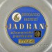 Štítek na předním víku automatiky JADRAN s názvem, logem společnosti a výrobním číslem.